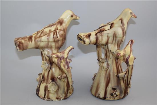 Two Yorkshire glazed red pottery figural bird whistles, second half 19th century, 25cm, restorations